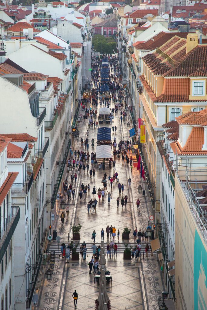 People walking on narrow street