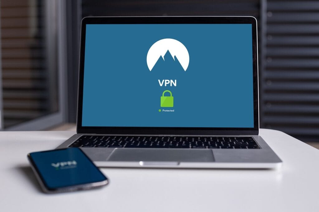 a laptop on a table showing vpn